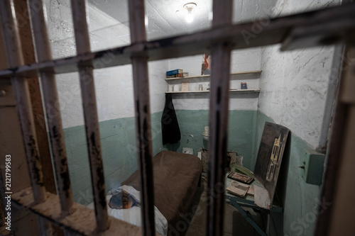 Alcatraz prison cell interior behind bars in San francisco