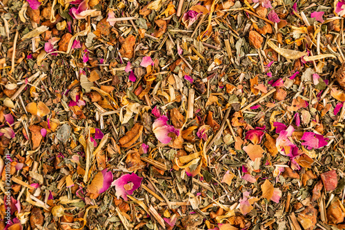 Herbal tea blend texture with petals and dried fruit