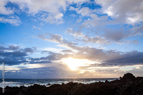 Dramatic coastal landscape at Ponta da Ferraria on Sao Miguel Island, Azores, Portugal, featuring volcanic shoreline, Atlantic Ocean and evening clouds