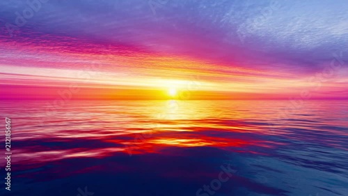A cinematic view of a colorful sunset over a calm ocean with vibrant pink, purple, orange, and blue clouds reflected on the peaceful sea surface.