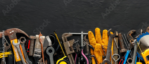 Group of worn work tools. Collection of used blue collar work equipment. For home improvement, diy repair projects, manual labor jobs, Father's day gift ideas, or to celebrate Labor Day.