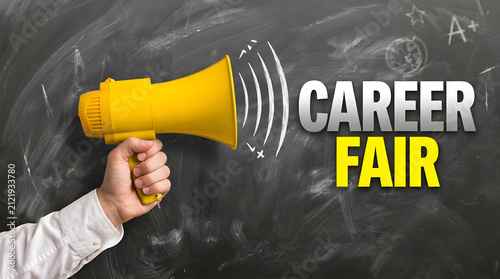 Bright yellow megaphone announcing exciting career fair event on chalkboard background with evoking motivation opportunity pointing toward chalkboard