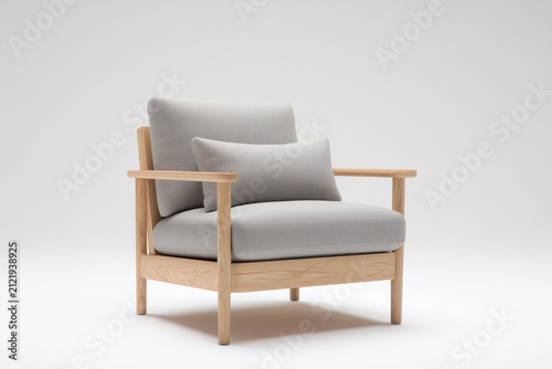 Modern Scandinavian Wooden Armchair with Grey Cushions Isolated on White Background