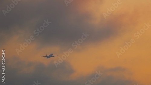 airplane in the sky during golde hhour
