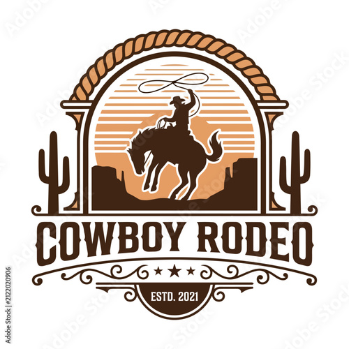 Quadro su tela Cowboy rodeo emblem with bucking horse and lasso rider in western desert landsca