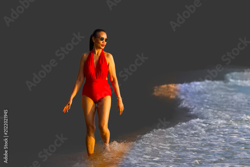 Woman pretty with red swimsuit on beach