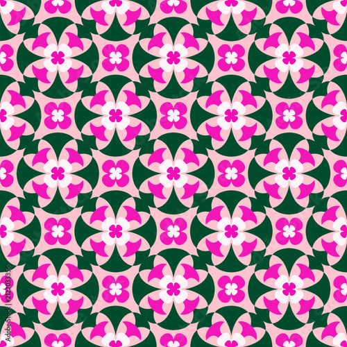 A bold seamless floral pattern with layered pink blossoms and dark green geometric shapes.