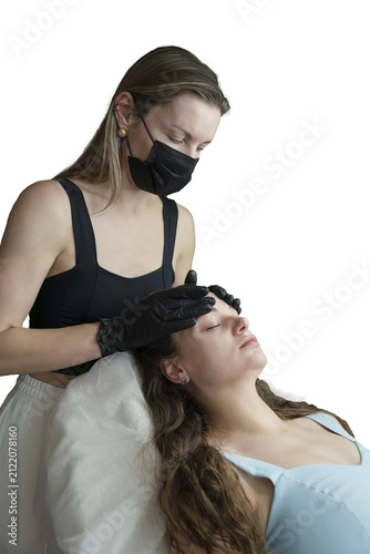 woman lies in an armchair, receiving a massage after a cosmetic injection, relaxing after a rejuvenation procedure, isolated object on transparent background, png