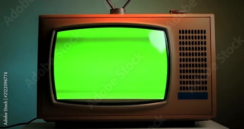 Vintage Television Set with Bright Green Screen for Chroma Key Compositing.