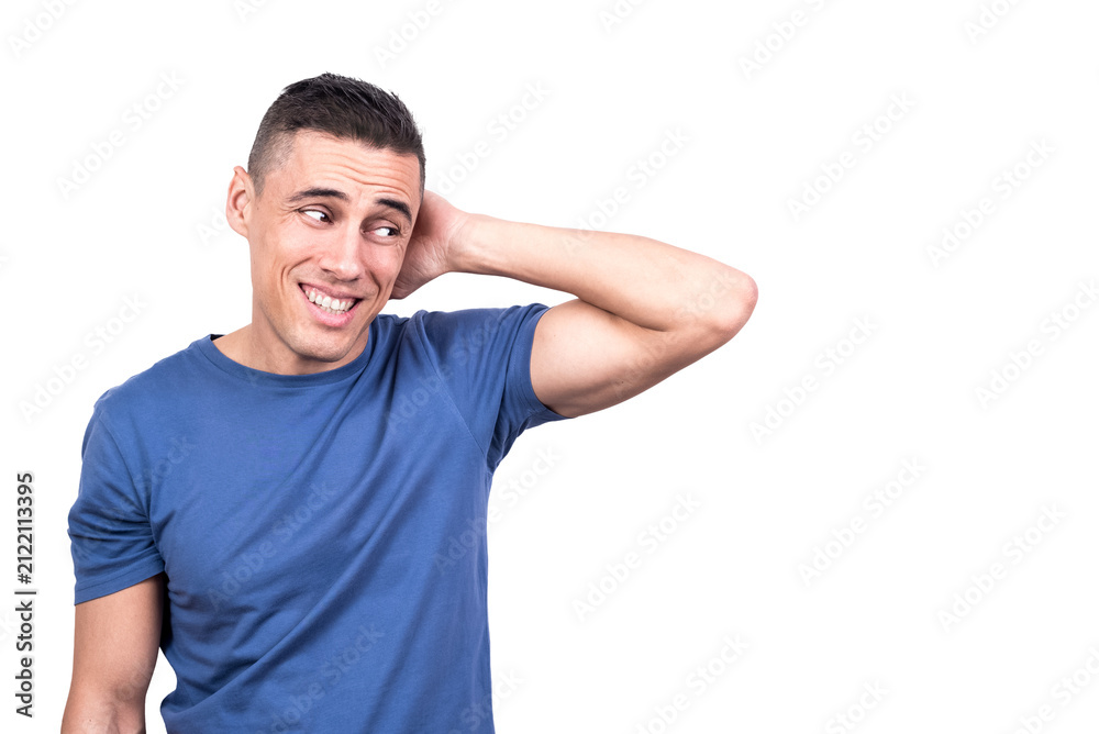 Obraz premium Shy man with his hand on his neck dissimulating