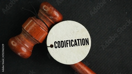 Принти на полотні Judge's gavel and tag with the word Codification is the process of putting rules, laws, or ideas into an organized system or a written code