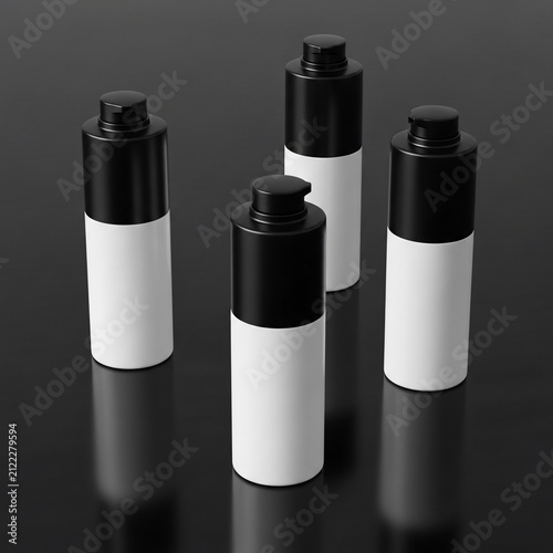 Four Black and White Bottles on a Reflective Surface