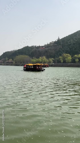 Cruise Ship Riding Along Yi River. Vertical Footage