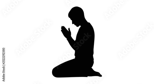 Fotografie Silhouette of Person Praying in Reverence and Meditation.