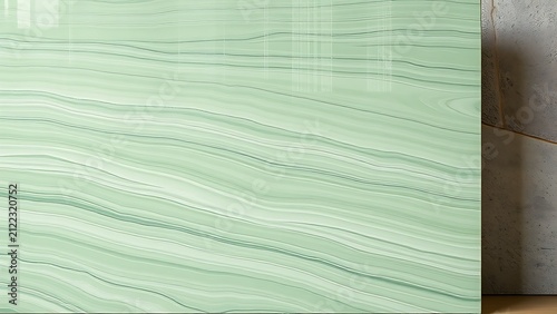Polished green marble slab with hill-like veins and raw split fieldstone, natural stone texture and decor concept.