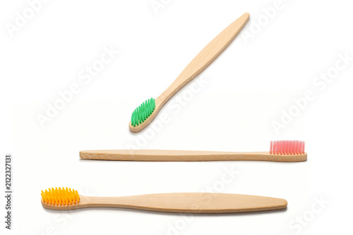 Bamboo toothbrush isolated on a white background.