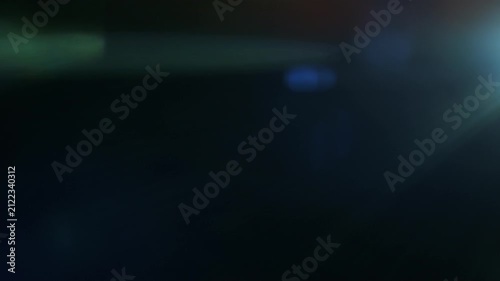 Real Shooted Anamorphic Lens Flare on Black Background in Super Slow Motion.