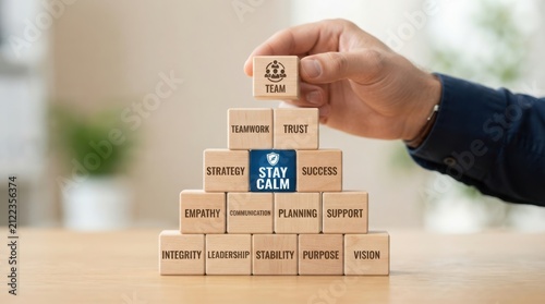 Stack of cardboard boxes with motivational words for teamwork