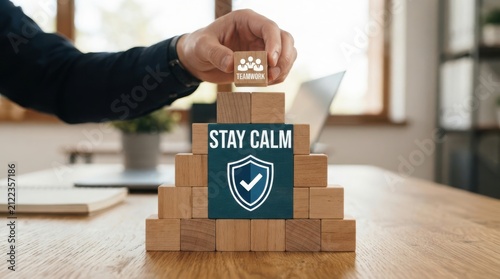 Stack of cardboard boxes with stay calm shield sign