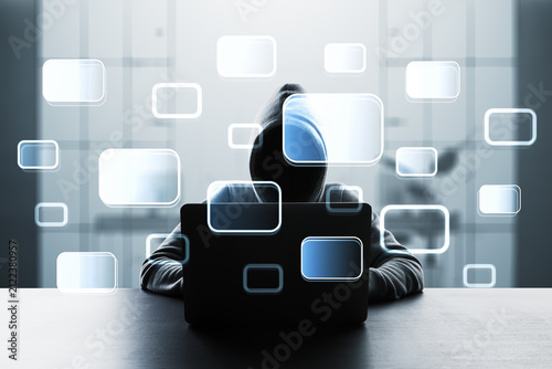 Canvastavla Anonymous hacker in hoodie behind laptop with floating interface panels, digital privacy and cybersecurity concept on a luminous blue background