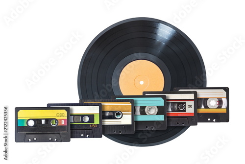 audio cassettes and vynil disc isolated on white