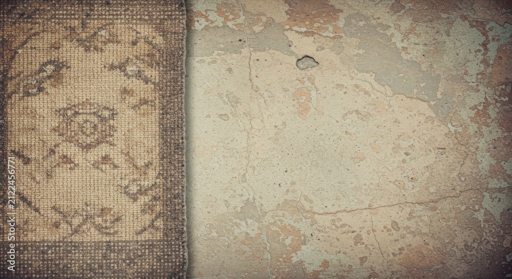 Fototapeta premium Vintage rug and weathered wall texture decorative background