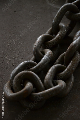 Fotografía Heavy metal chain links close up industrial background