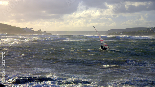 Fotografie windsurfing on choppy sea