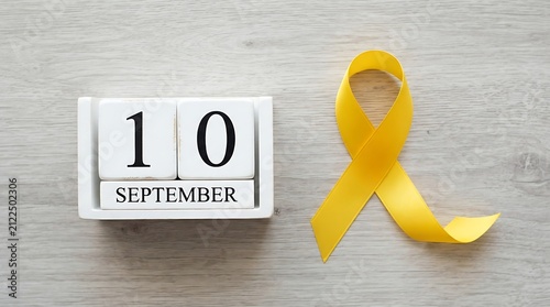 September 10 calendar date. Yellow ribbon for World Suicide Prevention Day awareness.
