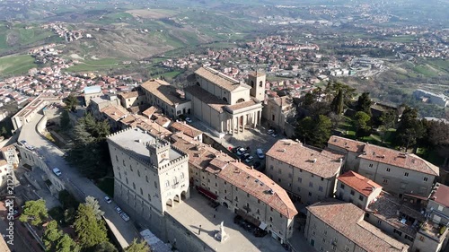 Aerial drone flyover of the historic Public Palace building in San Marino city centre