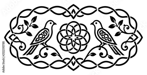 Birds and central flower enclosed in oval celtic knotwork border style