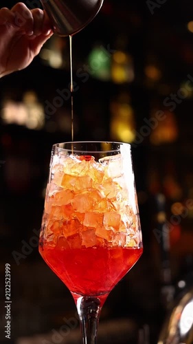 Bartender preparing cocktails at a bar