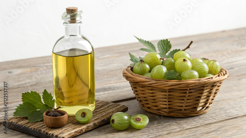 Amla Oil Bottle with Indian Gooseberry Isolated on White Background