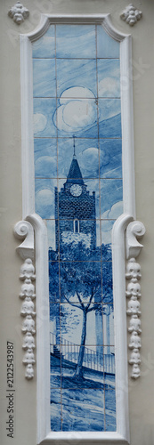 Blue and white azulejo tile panel depicting historic clock tower, Funchal, Madeira, Portugal