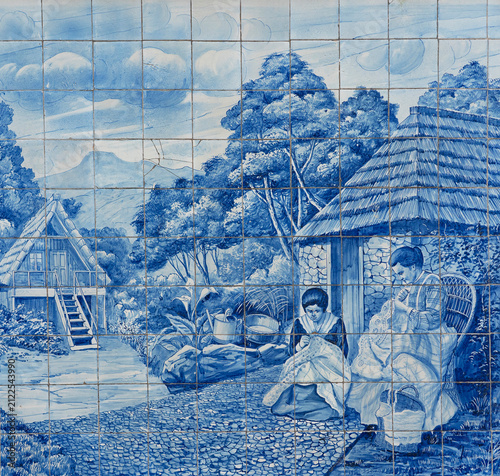 Blue and white azulejo tile mural depicting rural embroidery scene, Funchal, Madeira, Portugal 
