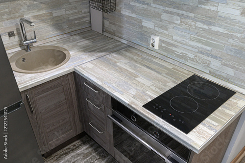 Принти на полотні compact modern kitchen corner: a beige undermount sink with a chrome faucet, a b