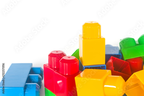 Pile of colorful plastic building blocks for kids