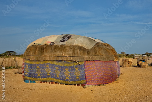 East Africa, Kenya, Kalacha. View of bulky yurts made of fabrics and skins of domestic animals among nomadic tribes of the rocky desert.