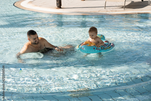 Father  and son in the pool