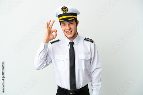 Bild auf Leinwand Airplane Russian pilot isolated on white background showing ok sign with fingers