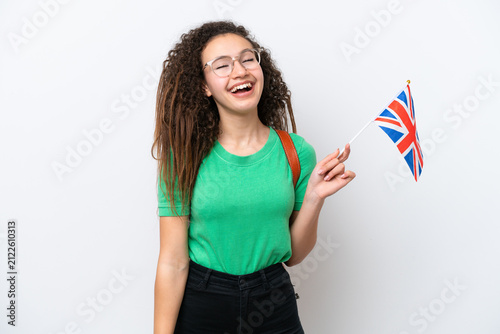 Canvas Print Young Arab woman holding an United Kingdom flag isolated on white background lau