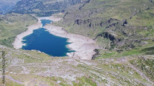 Above mountain peak with Twin lakes on background (Orobie mountains, Lombardy landscape in the summer)