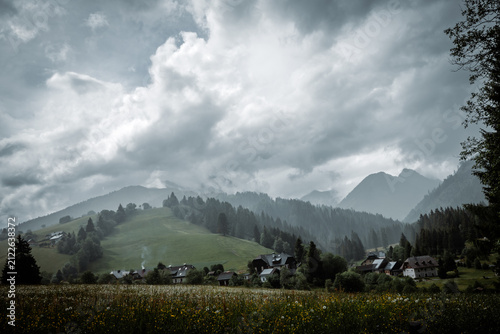 Dramatic Storm Clouds Over Alpine Landscape in Krakau Austria