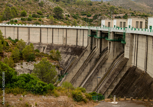 Canvastavla Wide view of the concrete wall and spillway structures of Beniarres hydro dam in