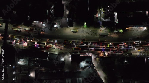 Aerial top down view of heavy traffic jam at night in asian city