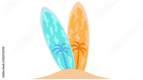 Photography Two colorful surfboards with palm tree designs standing in the sand