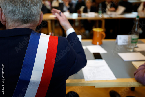 City Council. The mayor wearing the tricolor sash, a symbol of the Republic.