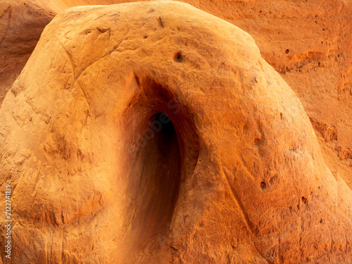 Obraz na płótnie a strange fissure in the shape of an oblong hole in the ochre soil of Roussillon