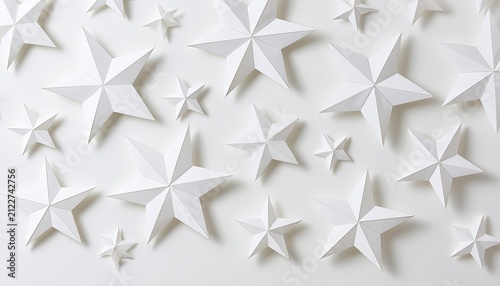 A Collection of White Origami Stars Scattered on a White Surface.