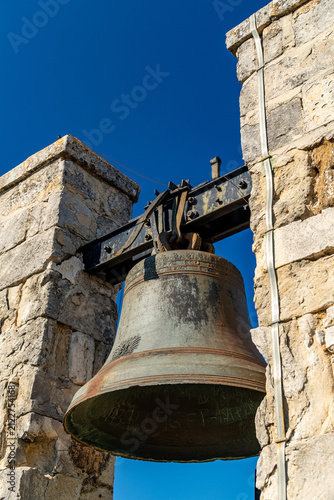 фотографія Historic Bronze Bell in Stone Belfry